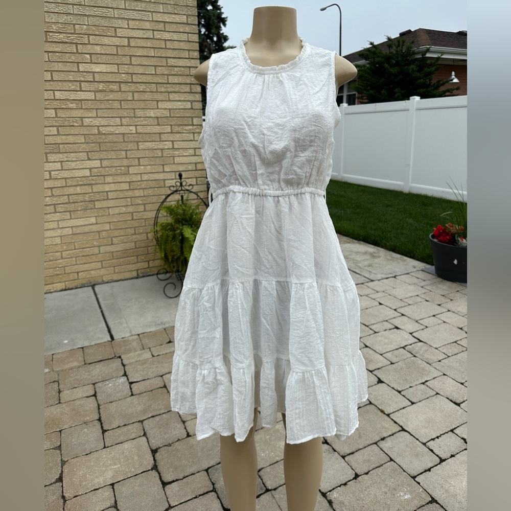 Ebby and Í cream fully lined dress size 12 juniors.